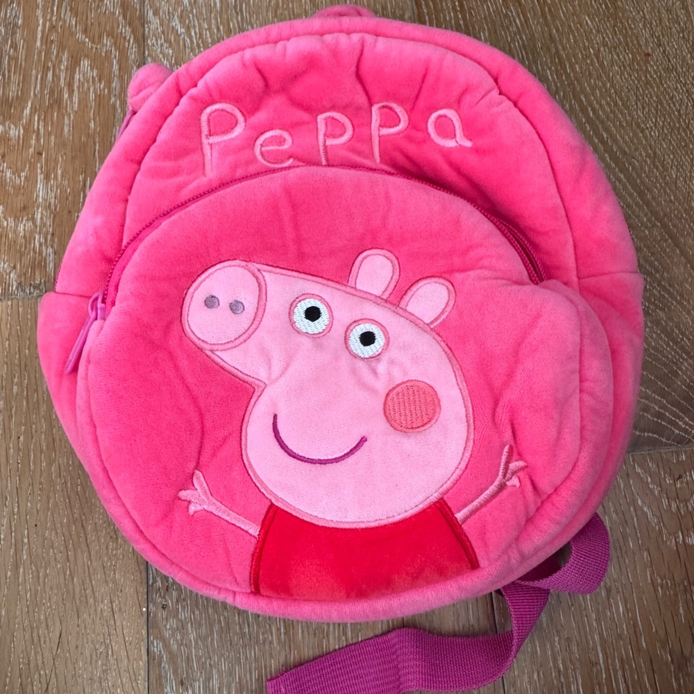 Used 80% new Pink Peppa Pig Backpack
